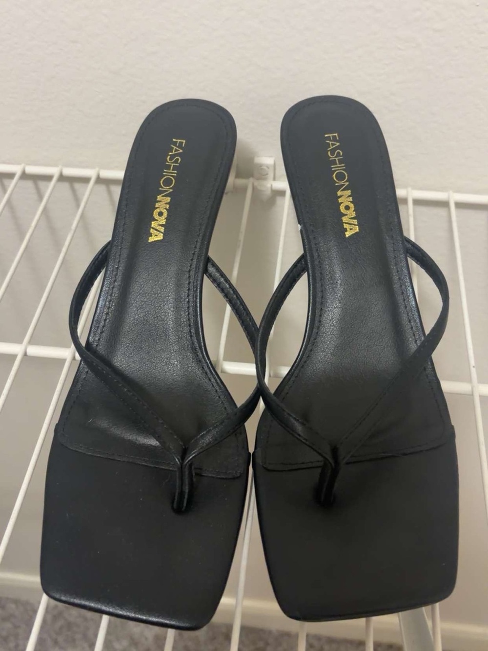 Woman’s Worn Fashion Nova Black Square-Toe Thong Heeled Mules
